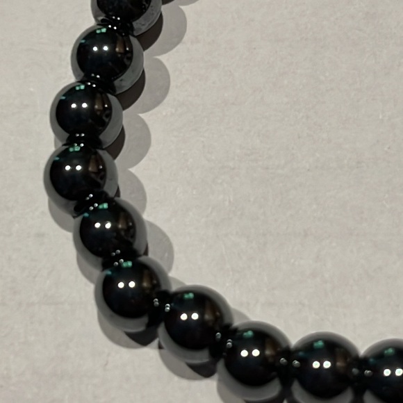 6mm Hematite (one) on stretch cord - Picture 3 of 3